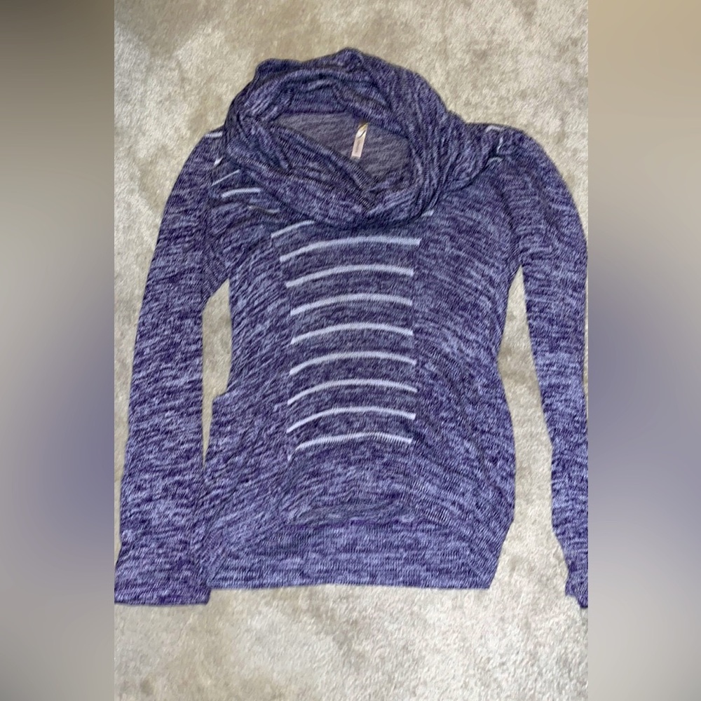 Purple turtle neck, very flattering with pockets